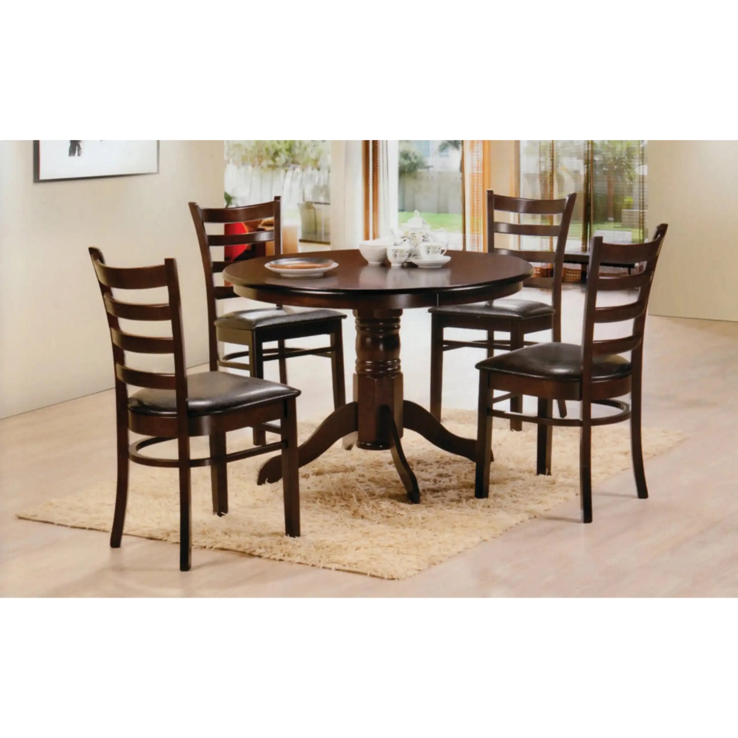 Dining room set with a round dark wood table and four matching chairs