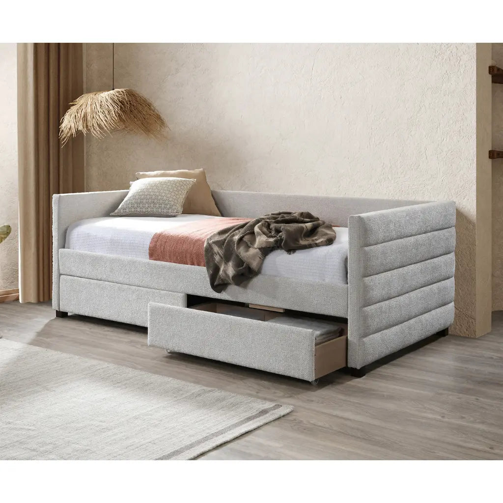 Grey upholstered bed with storage drawers