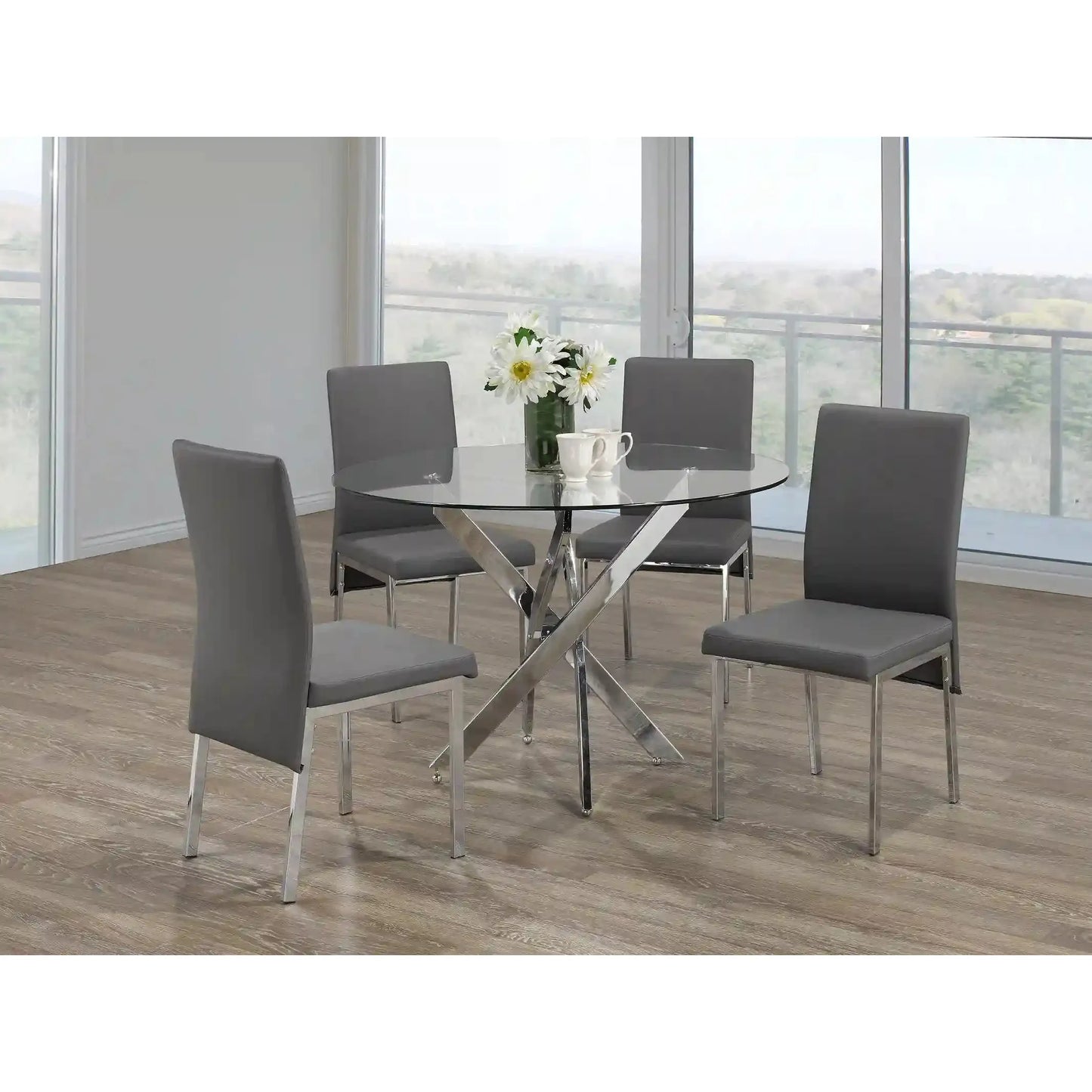 Dining room set with a glass table and grey chairs