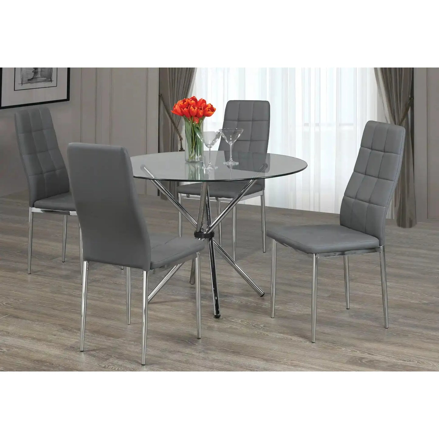 Dining room set with a round glass table and grey chairs