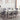 Dining room set with a marble table and gray velvet chairs