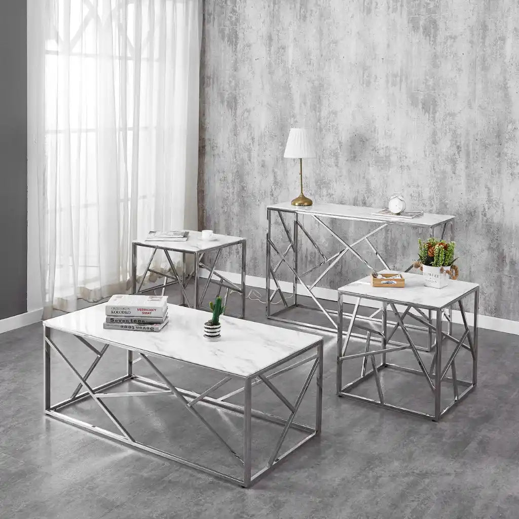 Set of marble coffee table and side tables with metal frames in a modern interior setting.