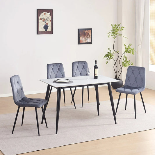 Dining set with a marble top table and four grey chairs
