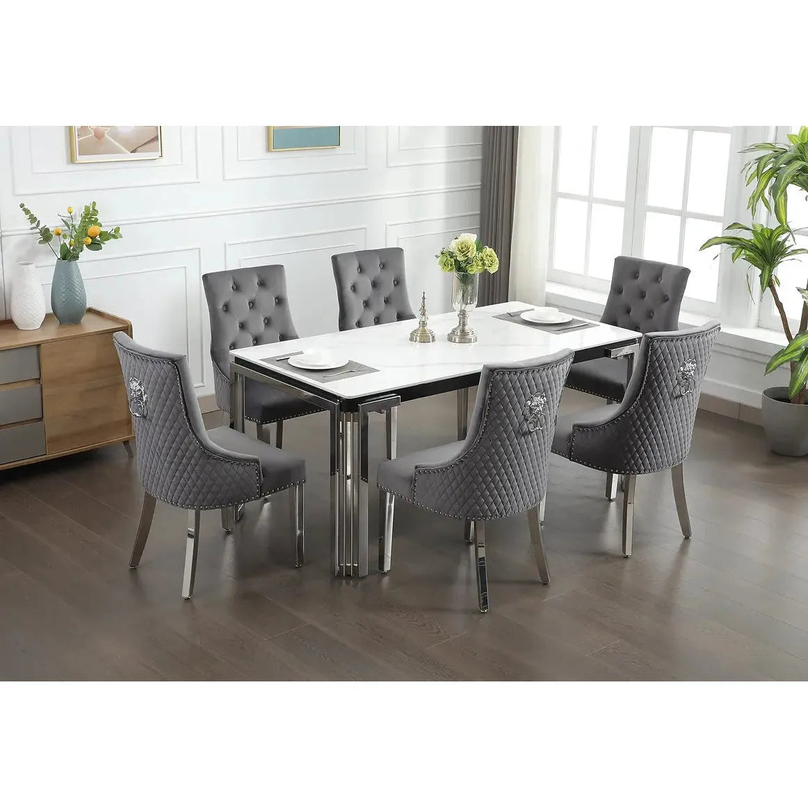 Dining room set with a white marble  table and grey chairs