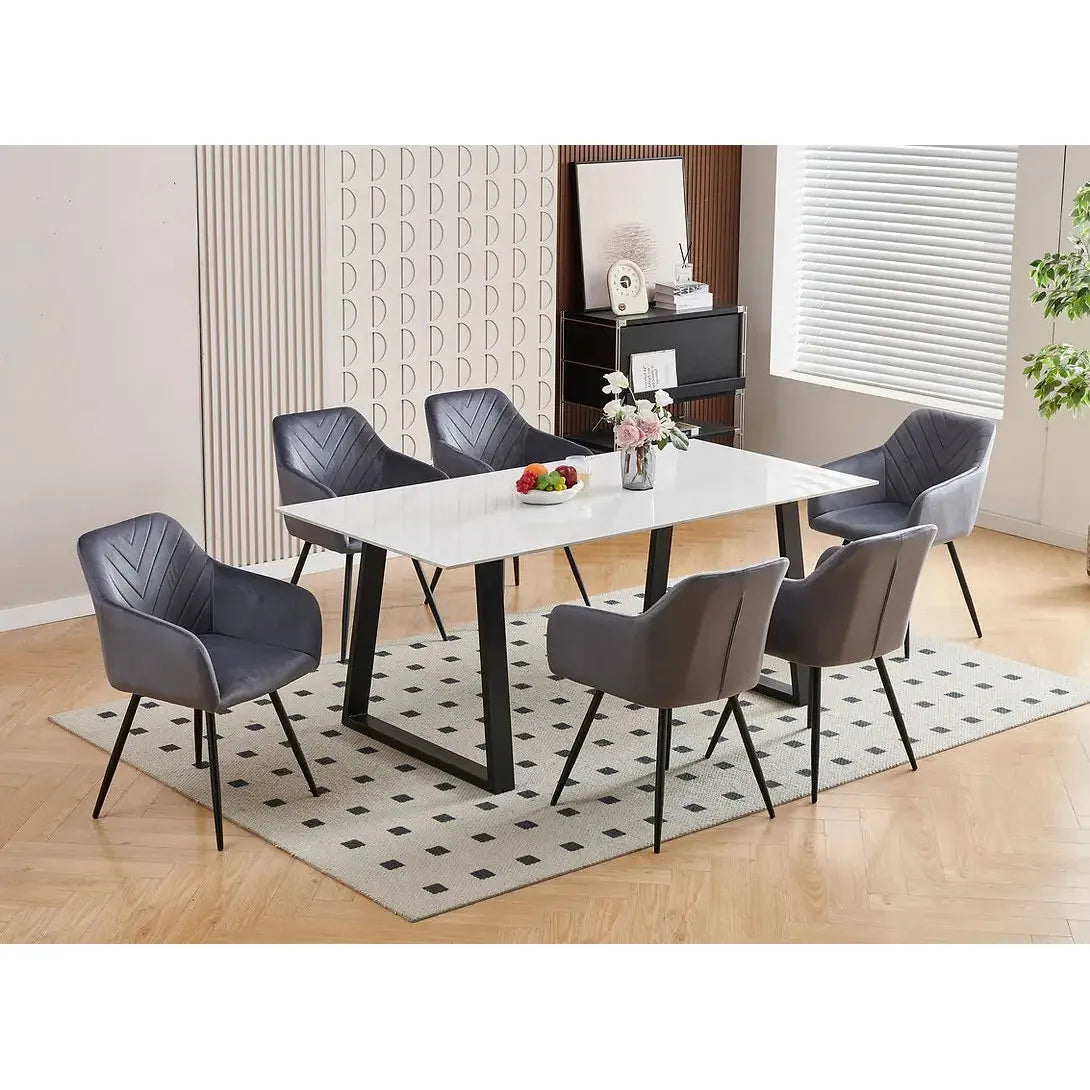Dining room set with a white marble top dining table and  grey velvet chairs