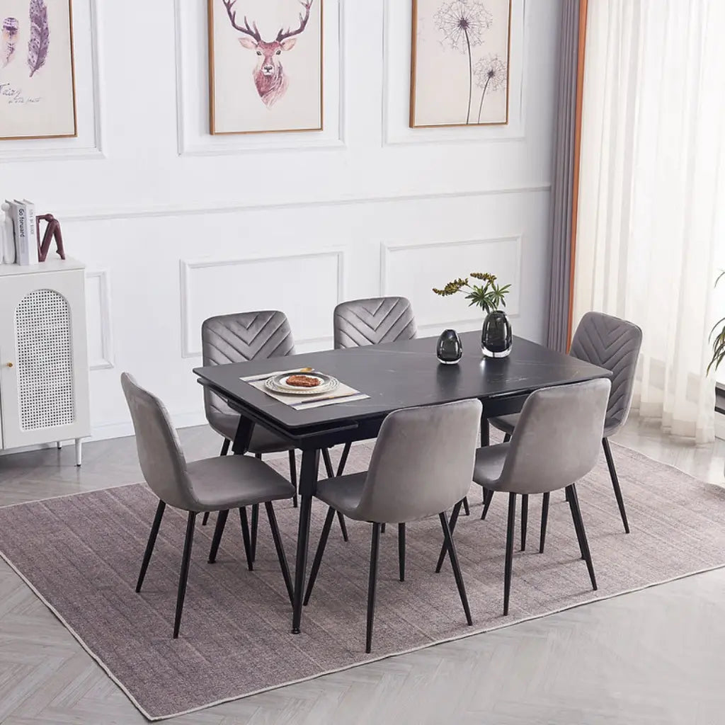 Dining room set with a black table and gray chairs 