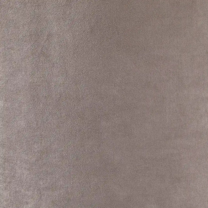 Close-Up Of Grey Velvet Accent Chair 