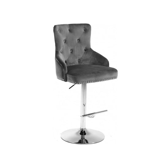 Grey tufted bar stool with a chrome base 
