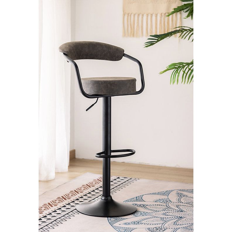 Bar stool with black metal frame and grey cushioned seat 