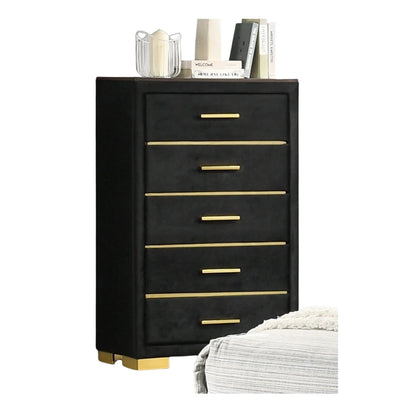Black dresser with gold accents