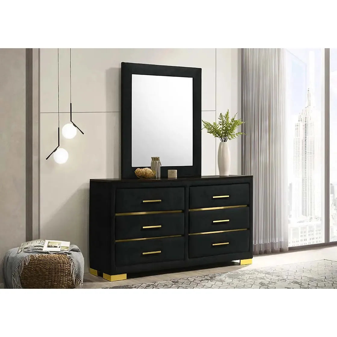 Black dresser with gold accents and a mirror