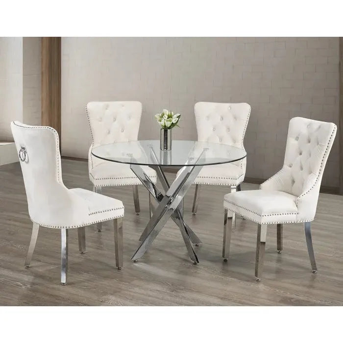 Dining room set with a glass table and four white tufted chairs 