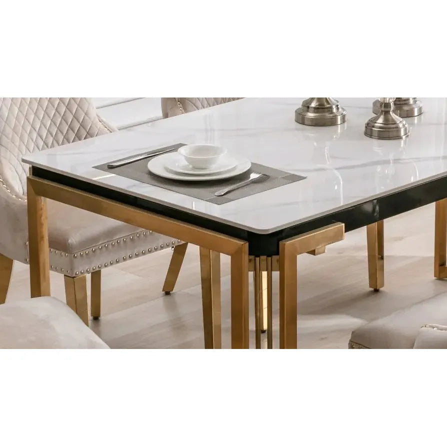 Dining table with marble top and gold legs