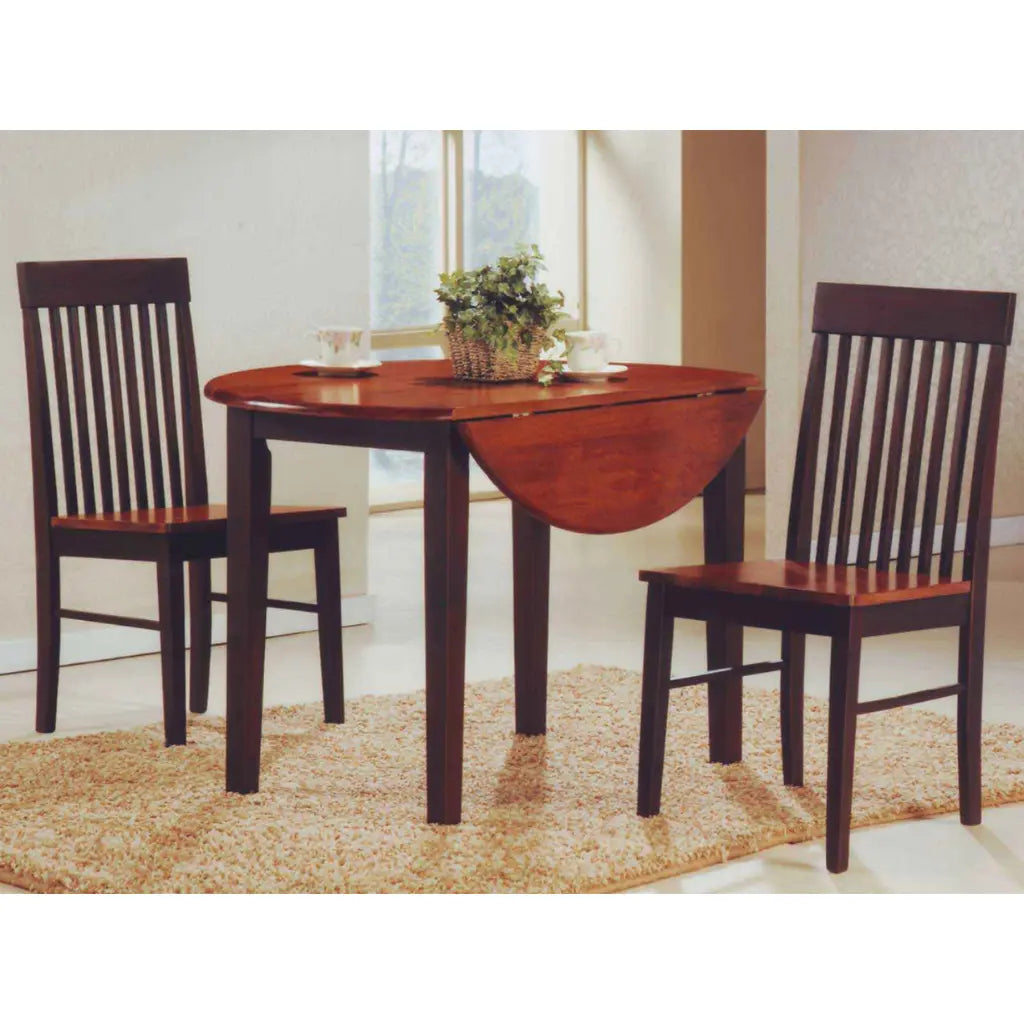 Dining table with two chairs in a room with a window