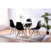 Dining room set with a round table and black chairs