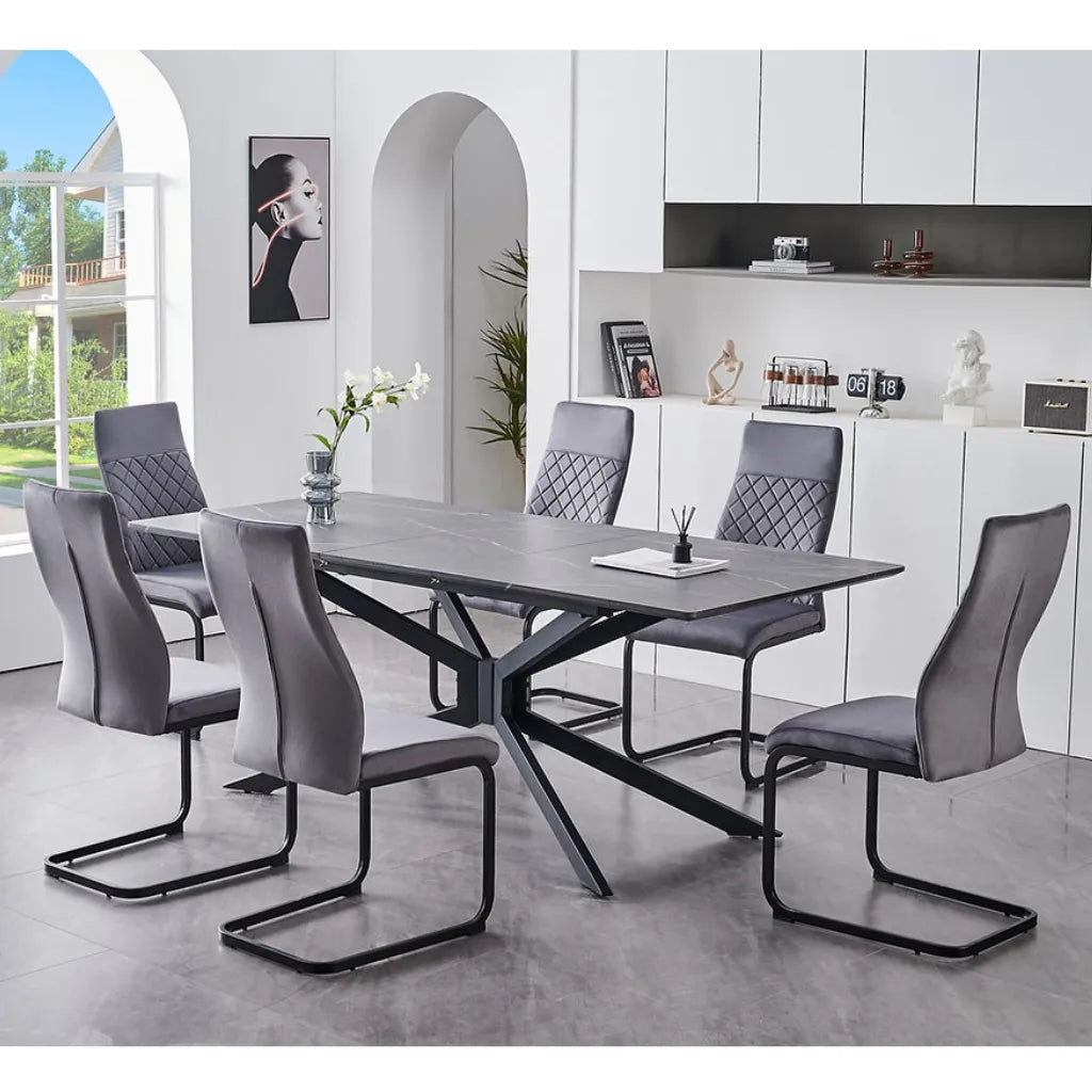 Dining set with a modern marble top table and grey chairs 