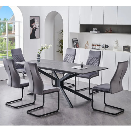 Dining set with a modern marble top table and grey chairs 