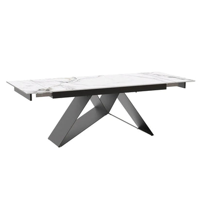 Modern dining table with marble-like top and metal legs 