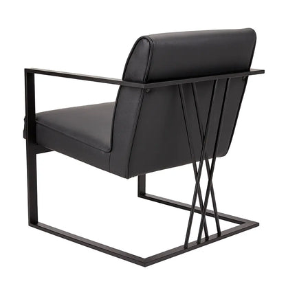 Black Faux Leather Accent Chair With Steel Frame. Available in Meuble Montreal.