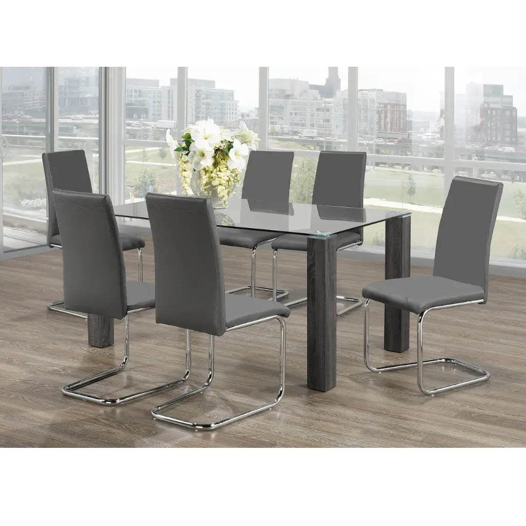 Glass dining set with six grey chairs 