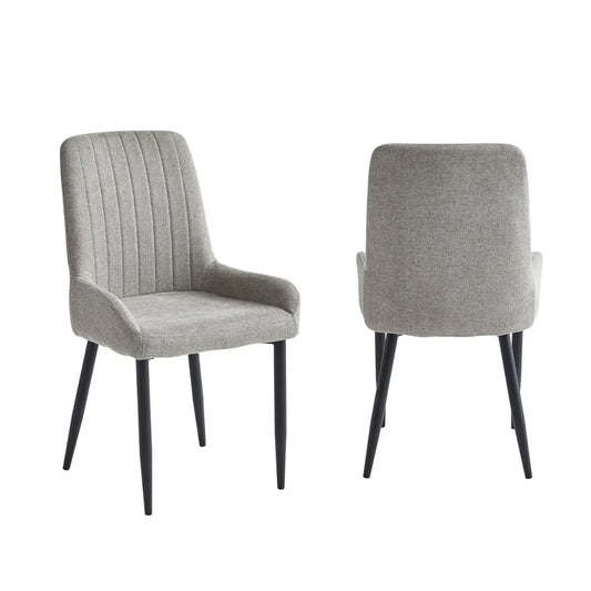 gray fabric upholstered dining chairs with black metal  legs 
