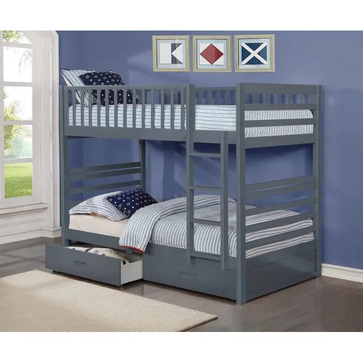 Grey bunk bed with a drawer .