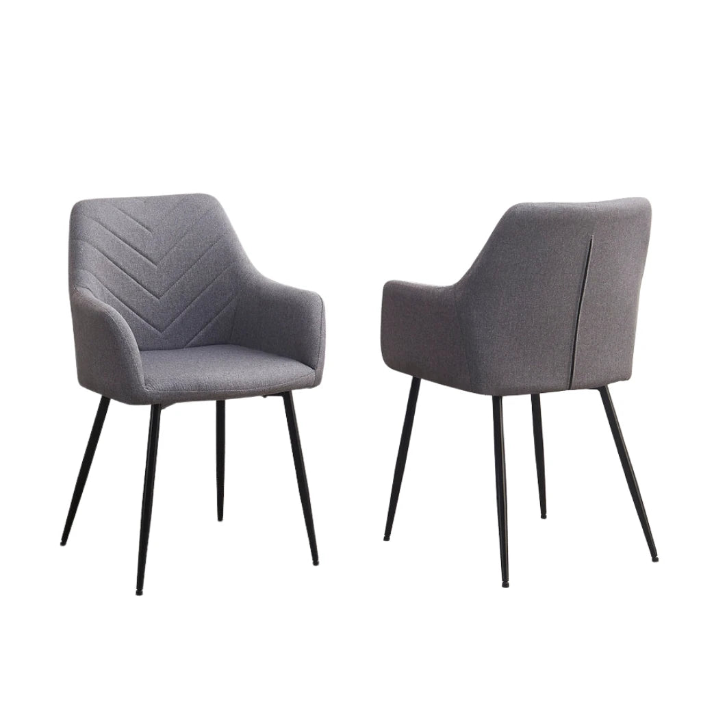 Two gray dining chairs with black legs 