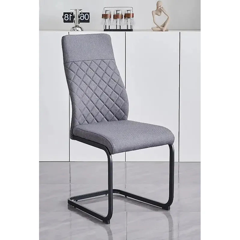 Black fabric dining chair with quilted backrest 