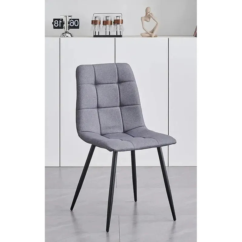 Gray Fabric dining chair with black legs 