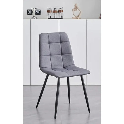 Gray Fabric dining chair with black legs 