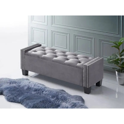 Grey tufted bench