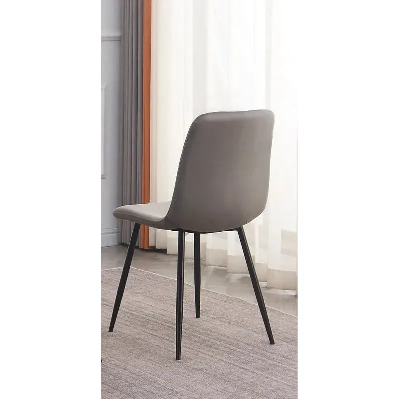 Gray chair with black legs 