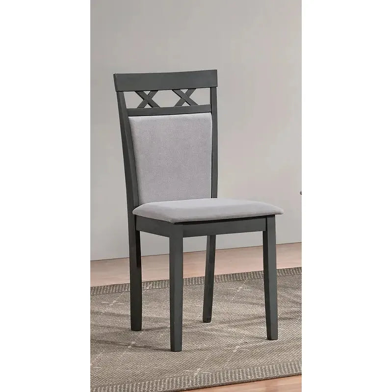 Grey dining chair with a fabric cushioned seat