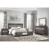 Grey bedroom set with bed, nightstand, storage chest and dresser mirror