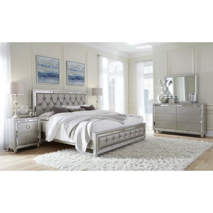 Modern bedroom set with grey furniture including bed, nightstands, storage chest and dresser.