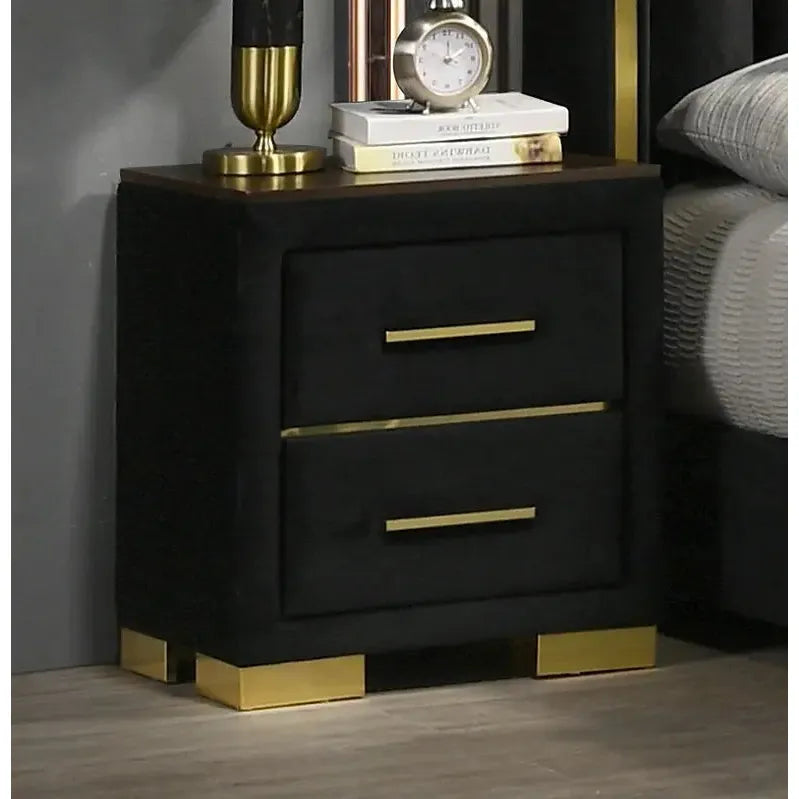 Black nightstand with gold accents and 2 drawers