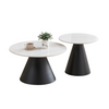 Two Piece round coffee tables with white marble tops and black cone-shaped legs 