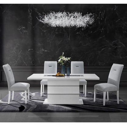 Dining room setup with a white table and chairs 
