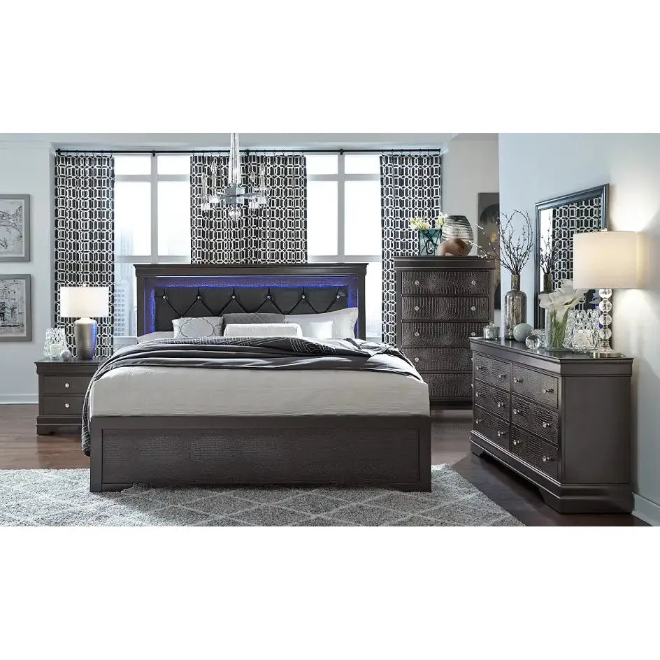 Modern bedroom set with gray furniture, including bed, dresser, storage chest and nightstands.