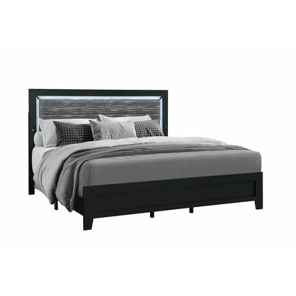 Black metal bed frame with grey bedding