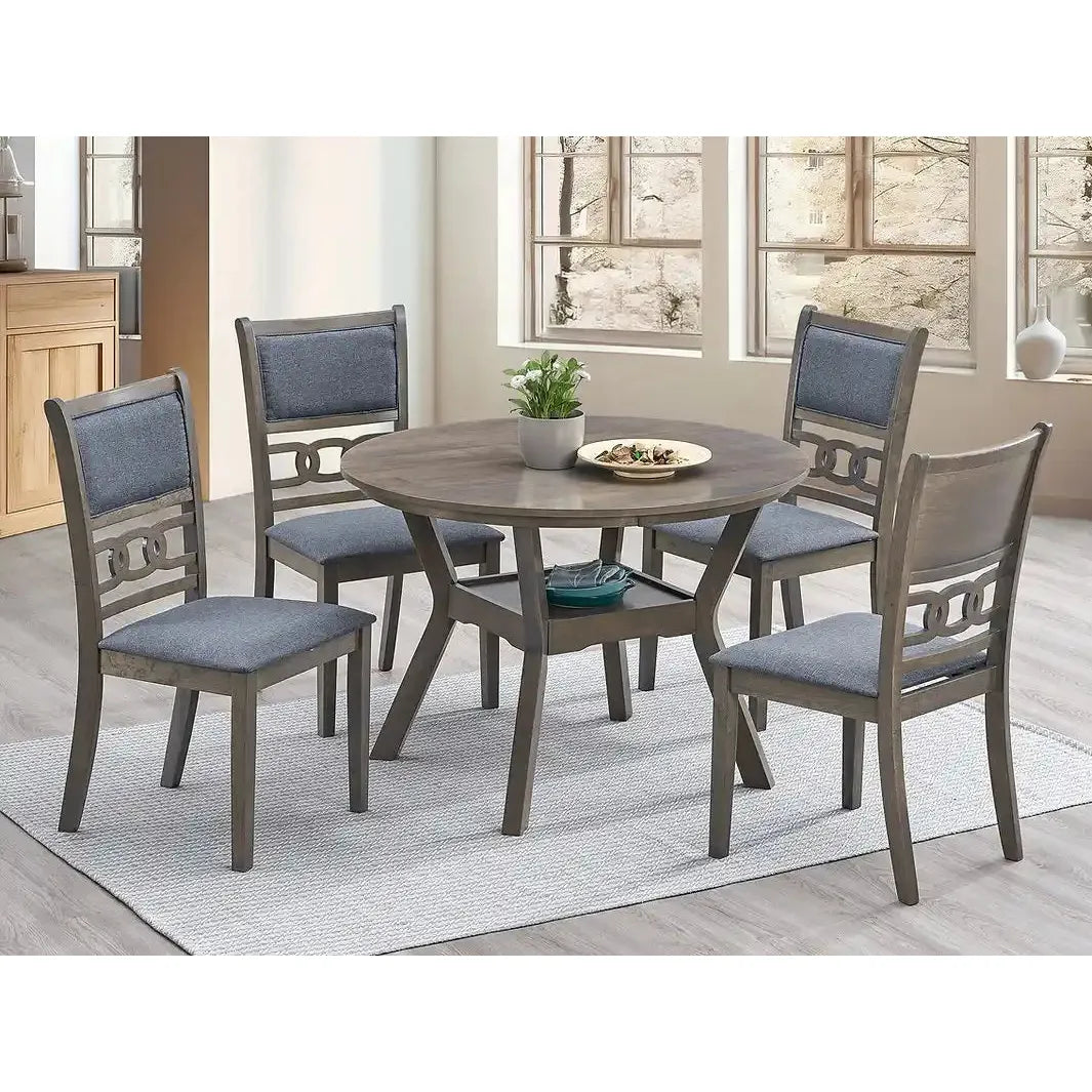 Dining room set with round table and four fabric chairs