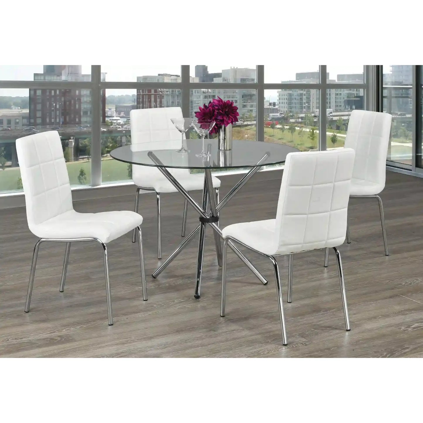 Dining room set with  round  glass table and white chairs 