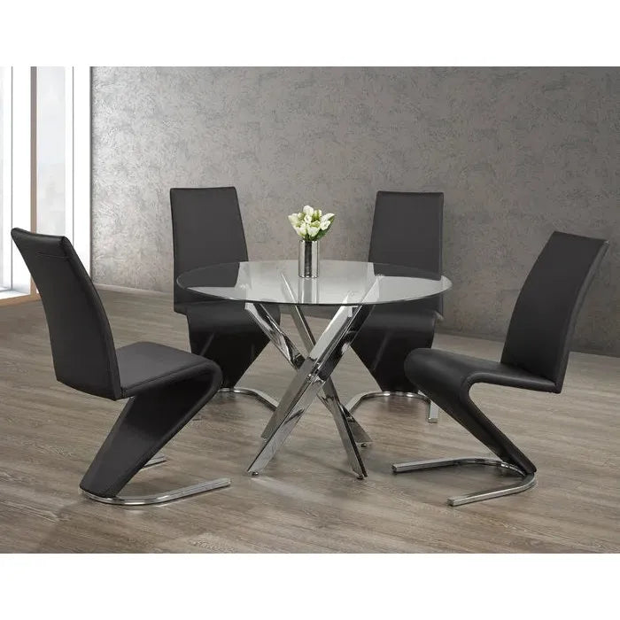 Dining room set with a glass table and black chairs 