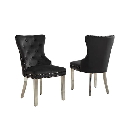 Set Of Two black upholstered chairs with silver legs 
