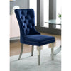Blue tufted accent chair with silver nailheads 