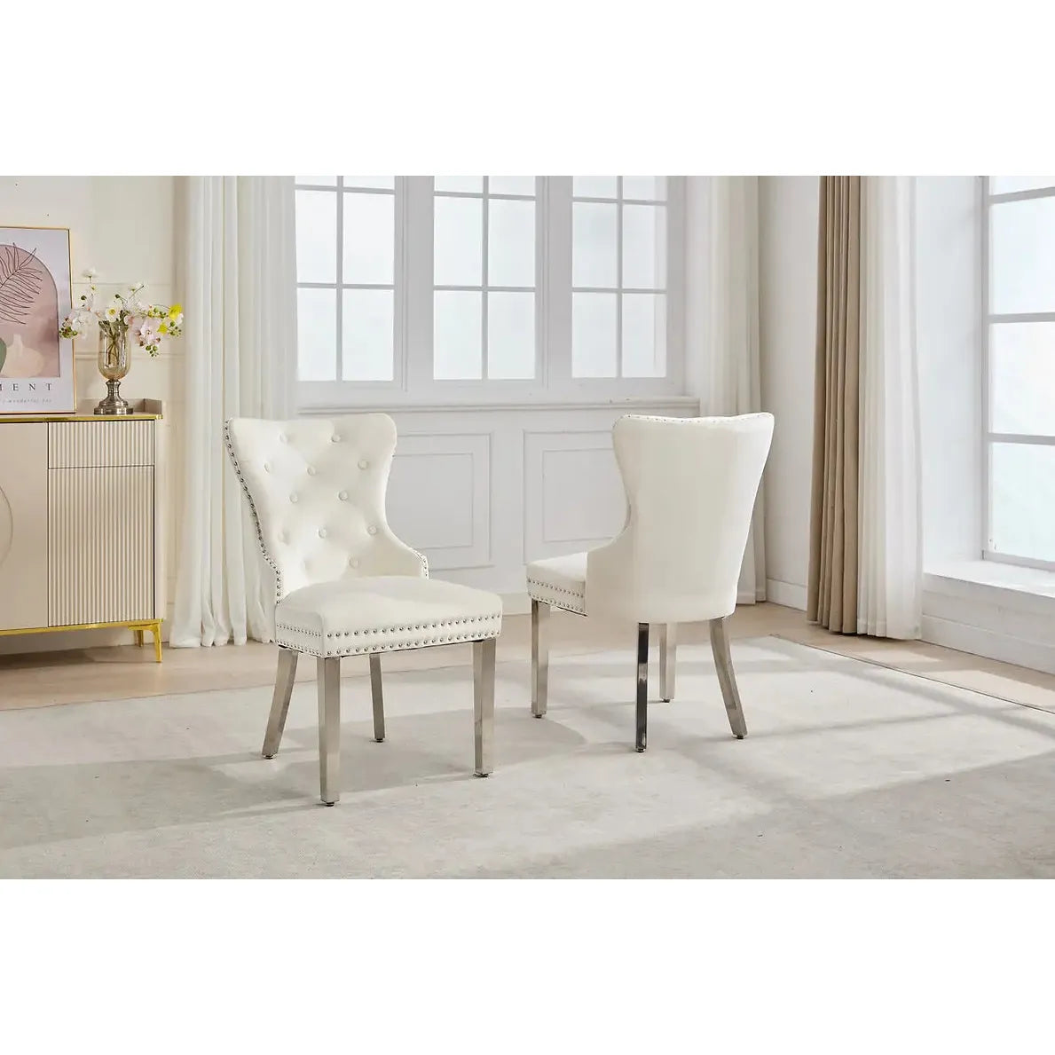 Set Of Two Cream dining chairs with tufted backrests