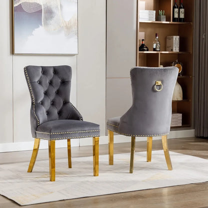 Set Of Two grey accent chairs with gold legs 