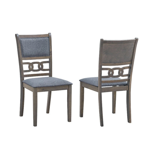 Two wooden dining chairs with gray  fabric cushioned seats 
