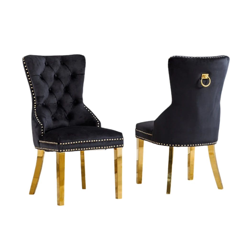 Set Of Two black upholstered chairs with gold accents 