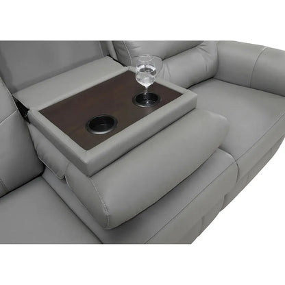 Gray leather sofa with a built-in wooden tray and cup holders.